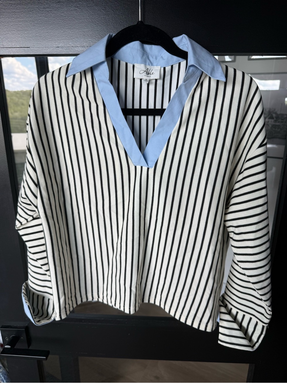 Able Black-and-White Striped Tunic with Light Blue Collar